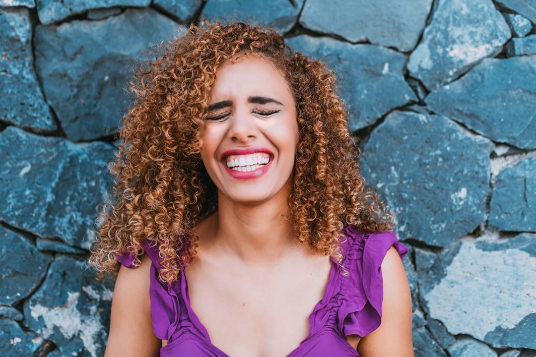 celebrity smiling after hardship
