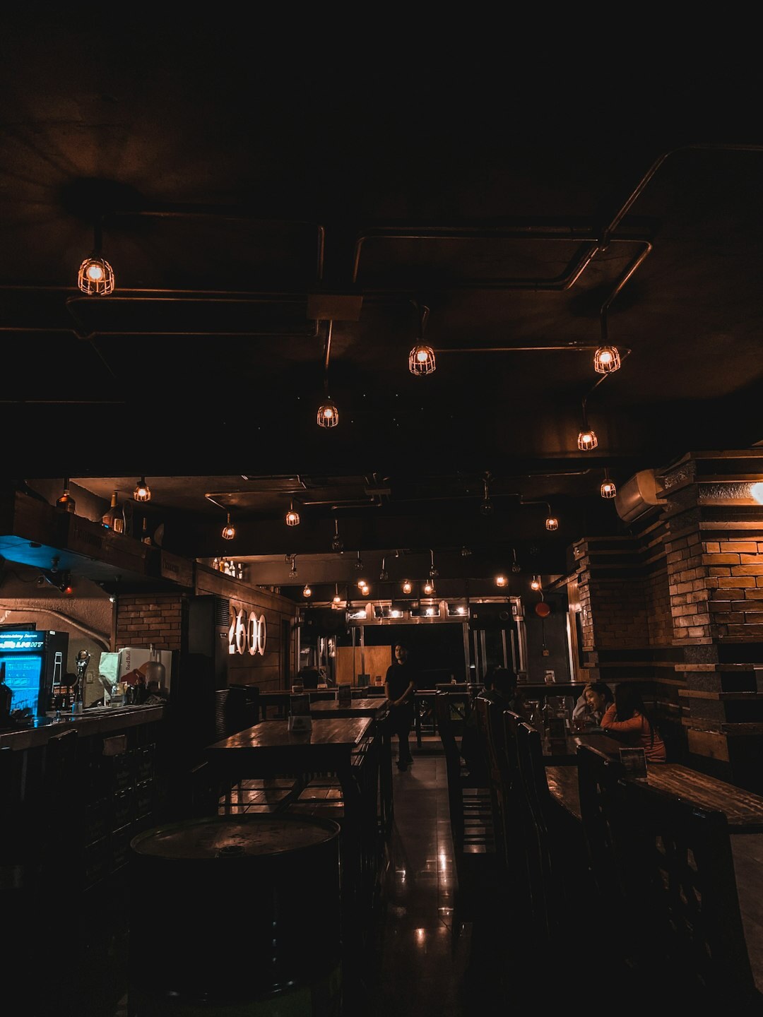 Empty vintage jazz club interior with dim stage lighting